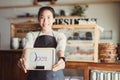 Portrait Asian woman business owner with bakery shop background Royalty Free Stock Photo