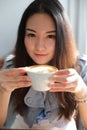 Portrait asian woman with cup of coffee
