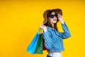 Portrait of Asian woman nice attractive wearing sun glasses carrying new shopping bag Royalty Free Stock Photo