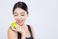 Portrait asian woman smiling holding green apple fruit and beautiful body diet with fit isolated on white background, girl weight Royalty Free Stock Photo