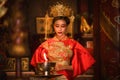 Portrait of asian woman in traditional Chinese dress in Chinese shrine