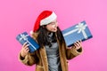portrait, Asian woman wearing long-sleeved outerwear wearing Christmas hat, Royalty Free Stock Photo