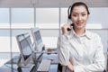 Portrait Asian women business office call center operator. Helpdesk support phone call team worker female teen smile with Royalty Free Stock Photo