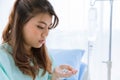 Portrait of Asian young beautiful woman patient eating pill or drug with isolated white background Royalty Free Stock Photo