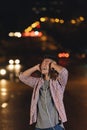 Portrait of a asian young man listening music. Royalty Free Stock Photo