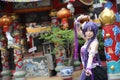 Portrait of asian young woman dancing with purple Chinese dress cosplay with temple Royalty Free Stock Photo