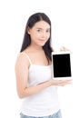 Portrait of asian young woman standing showing blank screen tablet isolated on white background Royalty Free Stock Photo