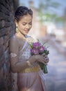 Portrait of asian younger woman wearing thai tradition clothes h Royalty Free Stock Photo