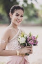 Portrait of asian younger woman wearing thai tradition clothes h Royalty Free Stock Photo