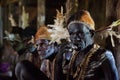 The Portrait Asmat warrior with a traditional painting and coloring on a face.