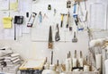 Assorted workshop tools on a pegboard Royalty Free Stock Photo