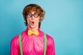 Portrait of astonished guy look wonderful high school novelty impressed scream wow omg wear funny spectacles geek bright Royalty Free Stock Photo