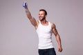 Portrait of athletic man in white undershirt with champions medal Royalty Free Stock Photo