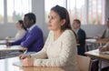 Portrait of attentive adult students on training session