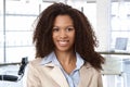 Portrait of attractive afro woman at office