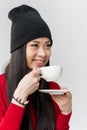 Portrait of attractive asian woman holding tea cup isolated Royalty Free Stock Photo