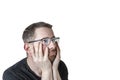 Portrait of an attractive bearded man of European appearance, with a slight gray hair, on an isolated white background. Thoughtful Royalty Free Stock Photo