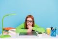 Portrait of attractive bored moody sullen girl using laptop spending day isolated over pastel blue color background