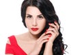 Portrait of attractive brunette girl with red lips and red nails. Isolated on white background Royalty Free Stock Photo