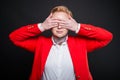 Portrait of attractive business covering eyes like blind concept