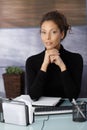 Portrait of attractive businesswoman at desk Royalty Free Stock Photo