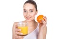Portrait of attractive caucasian smiling woman drinking orange j Royalty Free Stock Photo