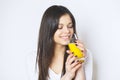 Portrait of attractive caucasian smiling woman isolated on white studio shot drinking orange juice face skin. Portrait of a pretty Royalty Free Stock Photo