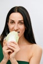 portrait of attractive caucasian smiling woman isolated on white studio shot eating salat