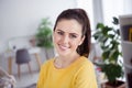 Portrait of attractive cheerful brown-haired girl housekeeper resting spending weekend spare time at home house flat