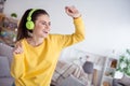 Portrait of attractive cheerful carefree girl dancing having fun listening hit single rest relax at home house flat Royalty Free Stock Photo