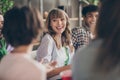 Portrait of attractive cheerful friends buddy fellow spending free time talking having fun gathering in house flat Royalty Free Stock Photo