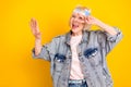 Portrait of attractive cheerful woman dancing having fun showing v-sign isolated over bright yellow color background Royalty Free Stock Photo