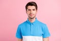 Portrait of attractive content brown-haired guy wearing casual shirt isolated over pink pastel color background