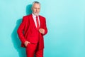 Portrait of attractive content classy grey-haired man mr wearing red suit copy space isolated over bright teal turquoise Royalty Free Stock Photo