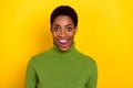 Portrait of attractive coquettish cheerful funny woman licking lips isolated over vivid yellow color background Royalty Free Stock Photo