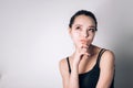 Portrait of a fashionable thoughtful young brunette woman.