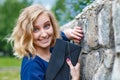 Portrait attractive girl with blond hair in a park Royalty Free Stock Photo