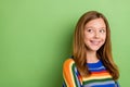 Portrait of attractive girly cheerful cunning pensive girl looking aside copy space isolated over bright green color