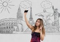 Portrait attractive and hot girl in short tight dresses making selfie with smartphone camera on background Figure 7 Royalty Free Stock Photo