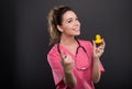 Portrait of attractive lady doctor inviting for a bath