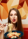 Attractive woman eating seafood pasta Royalty Free Stock Photo