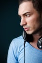 Portrait of attractive male deejay with headphones Royalty Free Stock Photo