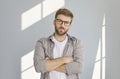 Portrait of attractive man standing with his arms crossed Royalty Free Stock Photo