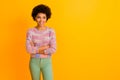 Portrait of attractive modern afro american girl cross hands listen her job friend look copy space wear stylish green