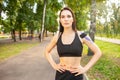 Fit woman with kinesiological taping posing outdoors. Royalty Free Stock Photo