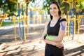 Fit woman with kinesiological taping posing outdoors. Royalty Free Stock Photo