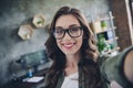 Portrait of attractive positive recruiter lady make selfie recording video toothy smile open space indoors