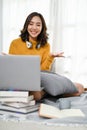 Attractive Asian businesswoman remote working, working from home, having an online meeting Royalty Free Stock Photo