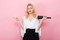 Blonde woman hold wine bottle and corkscrew Royalty Free Stock Photo
