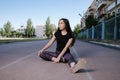 Portrait of attractive sport woman in sportswear posing outdoors at the stadium Royalty Free Stock Photo